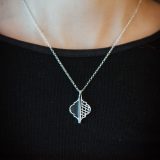 Tusenogèn Delt Smykke